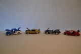 4 Die Cast Cars in Display Cases