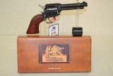 Gun. Heritage Rough Rider 22/22mag cal Revolver