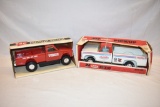 Two 1/16 Scale Pickup Truck Toys