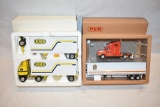 Two Freightliner Truck Toys