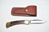 Buck 110 Folding Knife and Leather Sheath