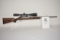Gun. Cooper Model 21 223 cal Rifle