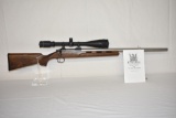 Gun. Cooper Model 21 223 cal Rifle