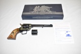 Gun. Heritage Rough Rider 22/22mag cal Revolver