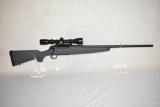 Gun. Remington Model 710 7mm mag cal Rifle