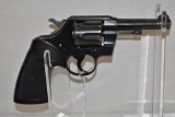 Gun. Colt Official Police 38 spec. cal. Revolver