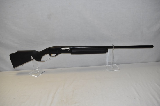 Gun. Remington Model 1100 12ga Shotgun
