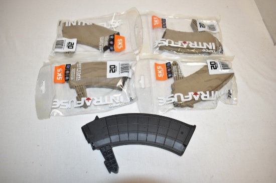 Five SKS Magazines.