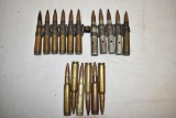 Ammo. 50 cal in Links. 5 Rds, 12 Dummy Rds