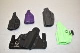 Five Plastic Pistol Holsters