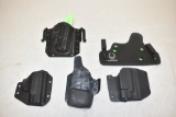 Five Plastic Pistol Holsters