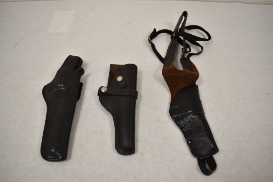 Three Leather Pistol Holsters.