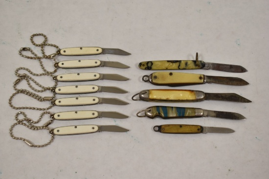 Twelve Mini Folding Blade Pocket Knives.