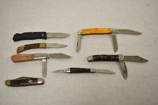 Seven Folding Blade Knives.
