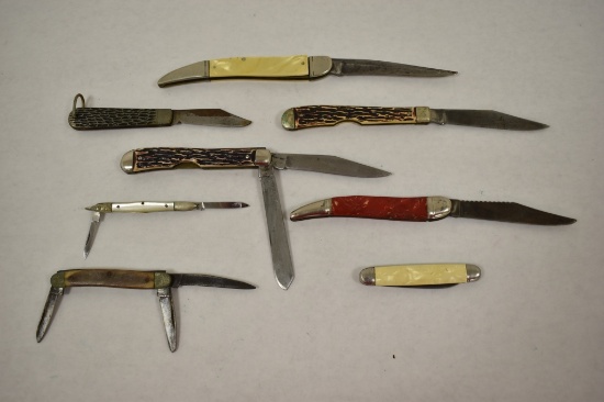 Eight Folding Knives.