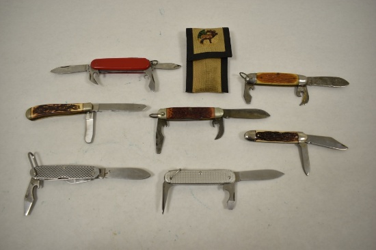 Seven Folding Pocket Knives & Canvas sheath.