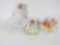 Lot of two porcelain faced baby dolls and one early wedding doll.