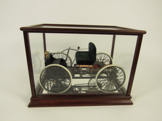 1896 Ford Quadricycle Franklin Mint 1:6 scale die-cast car presented in wood/glass display case.