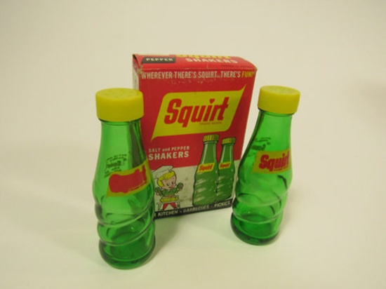 NOS set of 1960s Squirt Soda bottle shaped glass salt and pepper shakers.