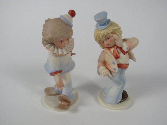 Lot of two 1980s Goebel Collectors Club Under the Big Top porcelain figurines.