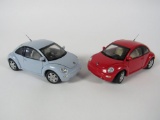 Lot of two Volkswagen New Beetle 1:24 scale diecast model Franklin Mint cars.