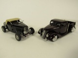 1932 Ford Deuce Highboy and a 1935 Ford Custom Rod Pickup Danbury Mint 1:24 scale diecast cars.