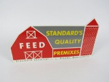 Circa 1950s Standard Quality Premixes single-sided die-cut tin barn shaped sign.