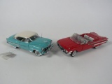 1954 Chevrolet Bel Air and a 1960 Impala Convertible Danbury Mint 1:24 scale models.