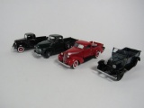 Lot of four Danbury Mint 1:24 scale diecast pickup trucks.