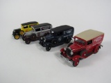 Neat lot of 4 Danbury Mint 1:24 scale 1931 Delivery Trucks.