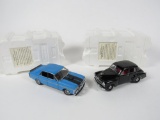 Rare Trax 1:24 scale models XY Falcon GTHO and a FJ Holden Special Sedan.