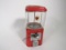 1950s Acorn 1-cent peanut machine with glass dome.