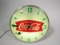 Awesome circa 1950s Drink Coca-Cola glass-faced light-up diner clock with fishtail logos.