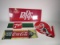 Lot consisting 1980s Dr. Pepper and 7-up signs, Coca-Cola Spanish flange and a reproduction sign.