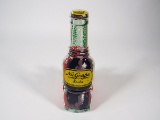 NOS 1950s NuGrape Soda single-sided die-cut three-dimensional bottle-shaped sign.