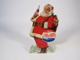 Late 1950s Merry Christmas Pepsi-Cola die-cut cardboard sign with built-in easel back.