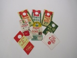 Large lot of ten Coca-Cola promotional items consisting of bottle toppers and napkins 1950s-60s.
