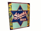 Very clean circa 1930s Enjoy Gluek's Beer single-sided embossed tin tavern sign.
