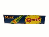 NOS 1958 Drink Squirt Soda embossed tin sign with bottle graphic.