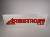 Armstrong Tires single-sided embossed tin garage sign.