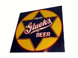 NOS 1940s Enjoy Gluek's Beer single-sided embossed tin tavern sign.