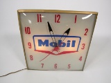 Outstanding 1959 Mobil Oil glass-faced light-up service station clock with Pegasus logo.
