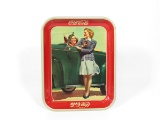 Excellent 1942 Coca-Cola serving tray featuring two girls with a period convertible.