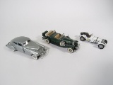 Lot of three Danbury Mint 1:24 scale die cast model cars.