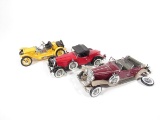 Sharp lot of three Franklin Mint 1:24 scale die-cast model cars.
