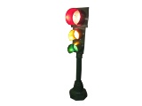 Neat municipal traffic light on stand.