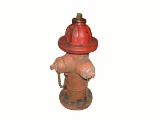 All original cast-iron municipal curb side fire hydrant.