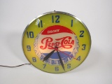 Killer 1950s Drink Pepsi-Cola glass-faced light-up diner clock with single-dot logo Pepsi Cap logo.