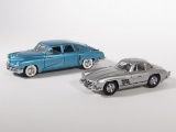 1948 Tucker Torpedo and 1954 Mercedes Gullwing Coupe Franklin Mint 1:24 scale diecast model cars.