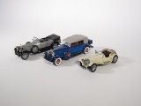 Lot of three Franklin Mint 1:24 scale die cast model cars.